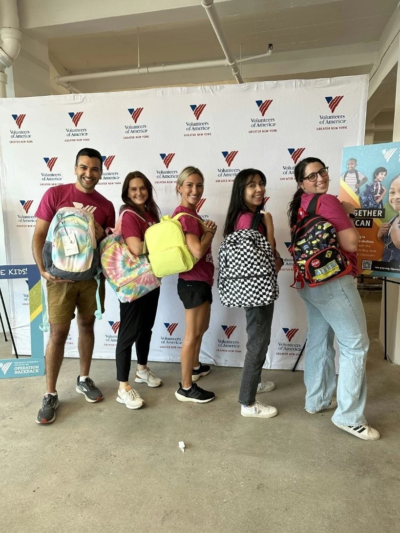 Our Giving Tree ERG members having a great time at Volunteers of America's Operation Backpack event. 