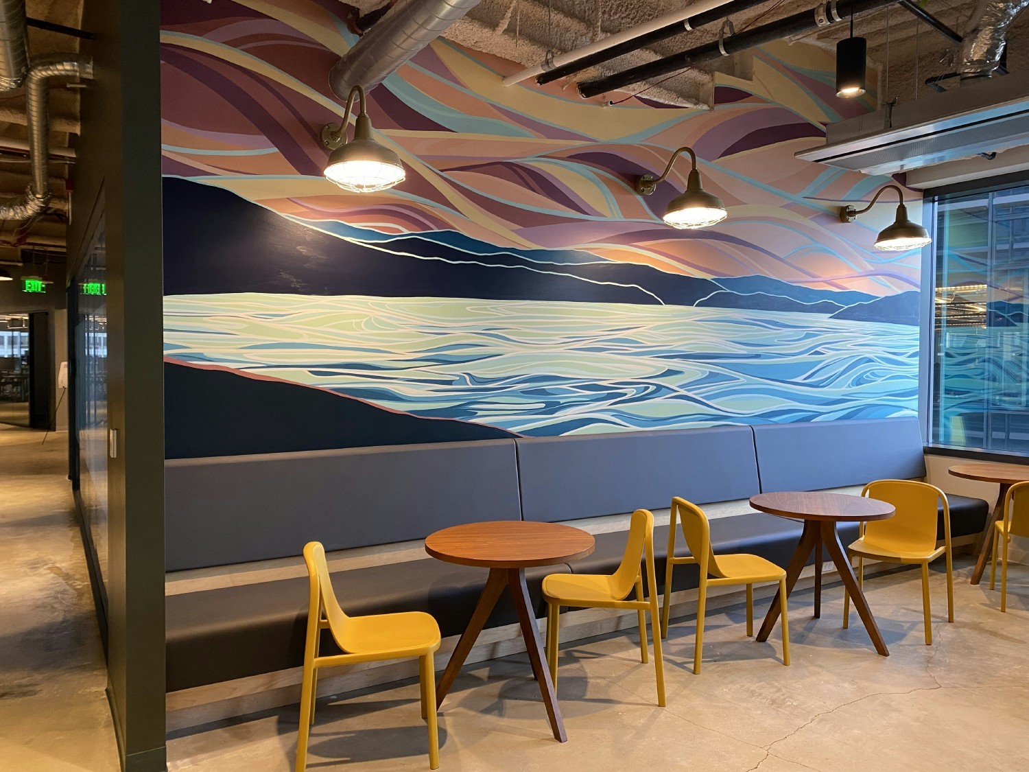 Beautiful mural and working space in our Seattle office