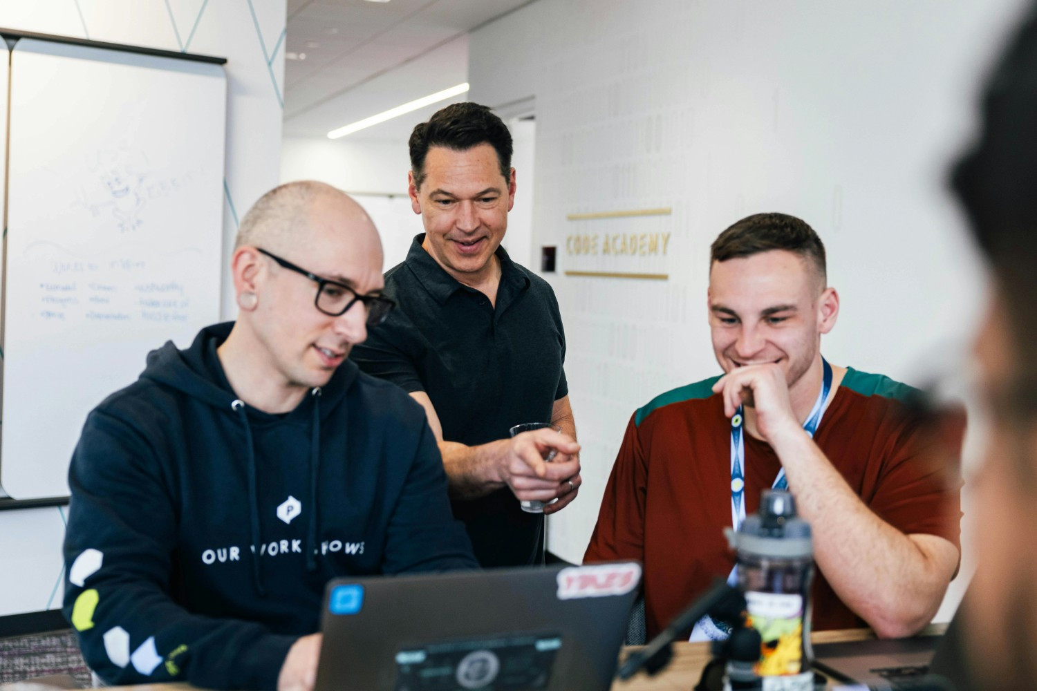 Employees work with c-suite leaders in POWER’s Creatorverse - the intersection of mission, technology, and imagination. 