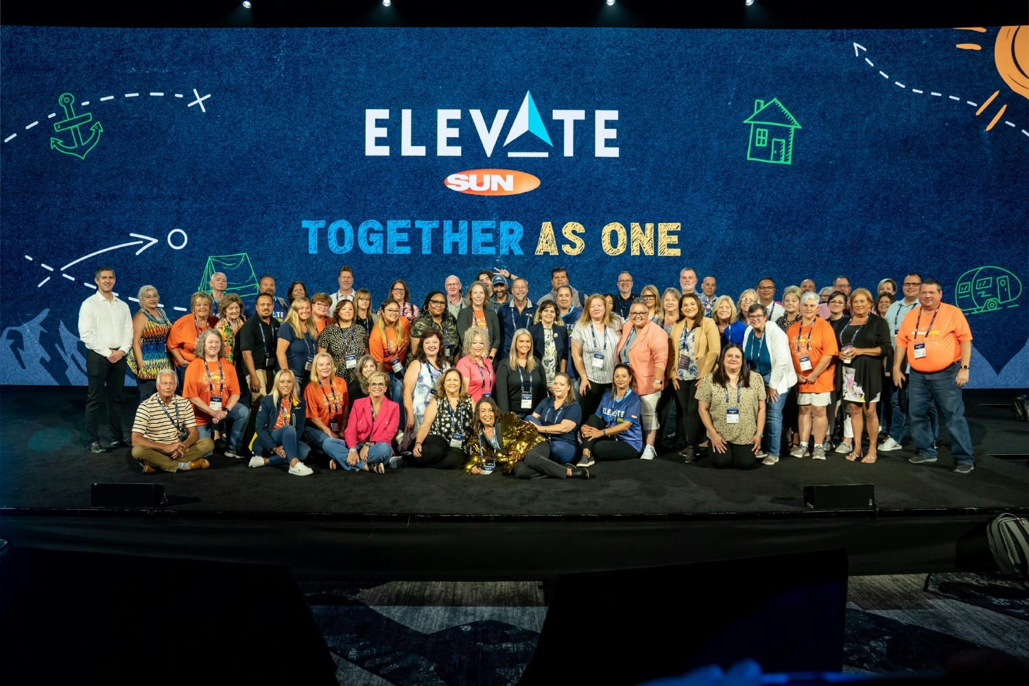 Together as One!  A group of Sun leaders are all smiles at our Biennial leadership conference, Elevate.