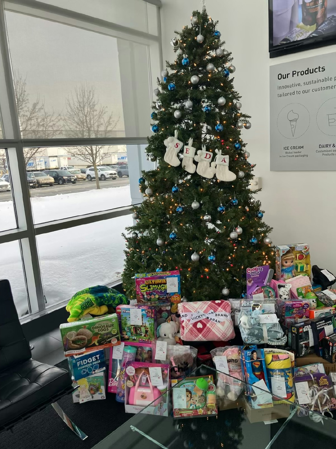 Our team shows up with heart—giving joy through donations for the Salvation Army Angel Tree - A tradition of LOVE!