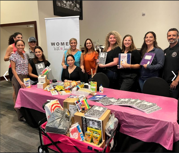 Members of our Women With Insight resource group collecting school supplies for a charitable giving campaign.
