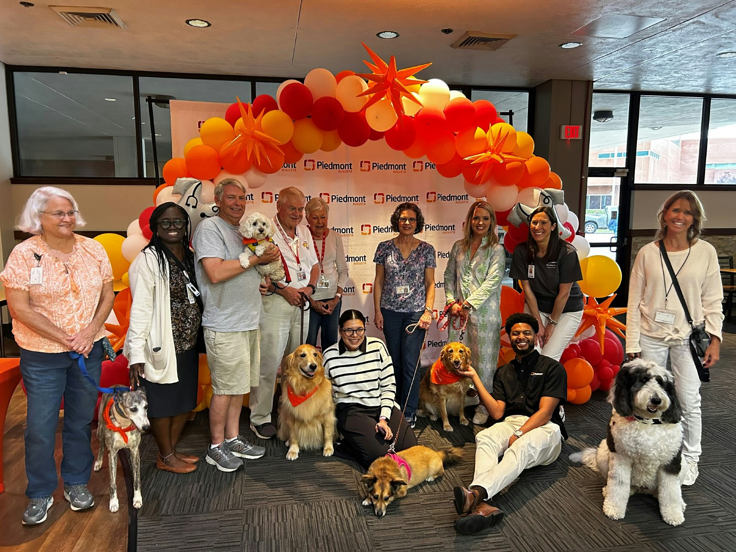 Piedmont Augusta Hospital celebrates with Pancakes & Pups (therapy dogs), to celebrate employees for Healthcare Week.