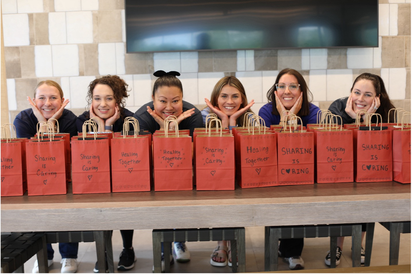 First American colleagues assembled care bags during 2024 Impact Day for children who recently lost a parent or sibling.