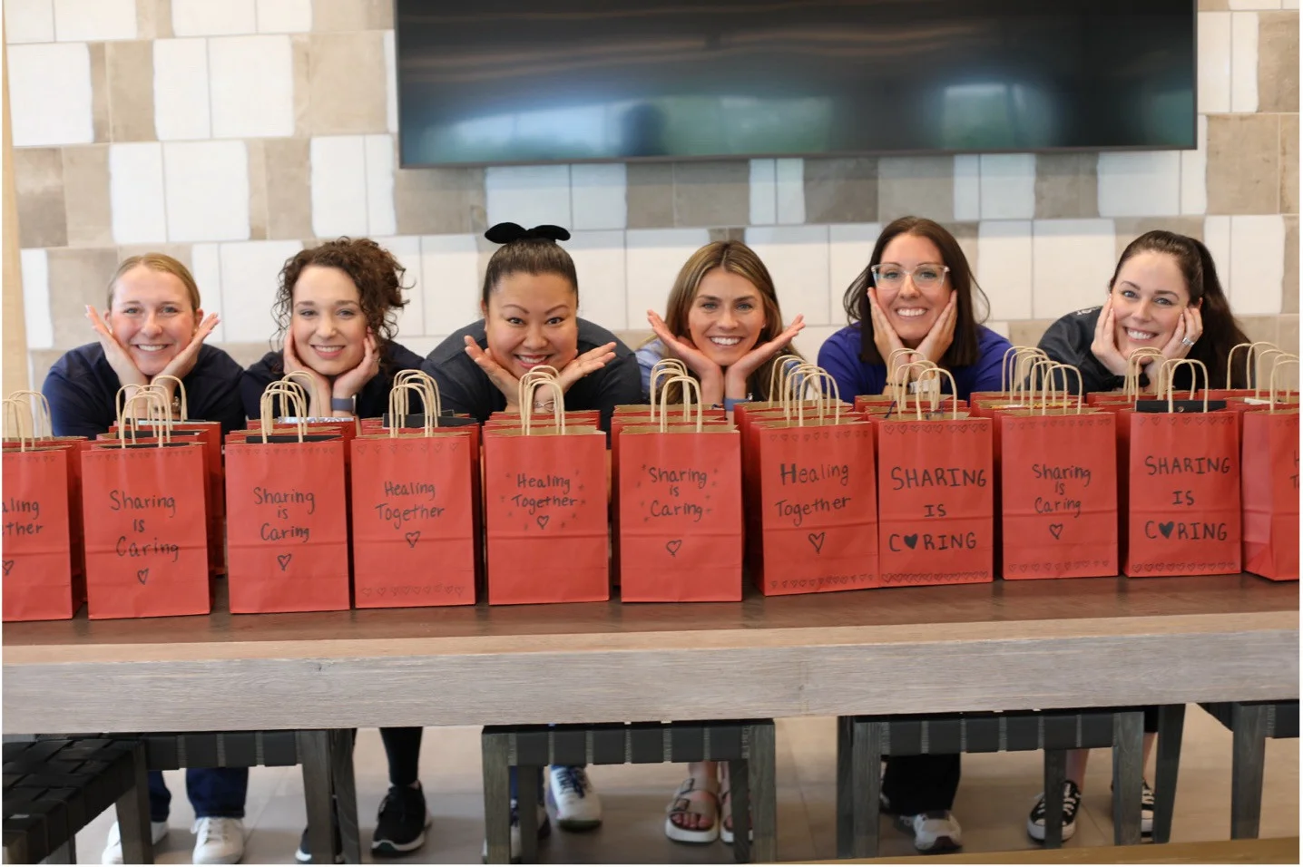 First American colleagues assembled care bags during 2024 Impact Day for children who recently lost a parent or sibling.
