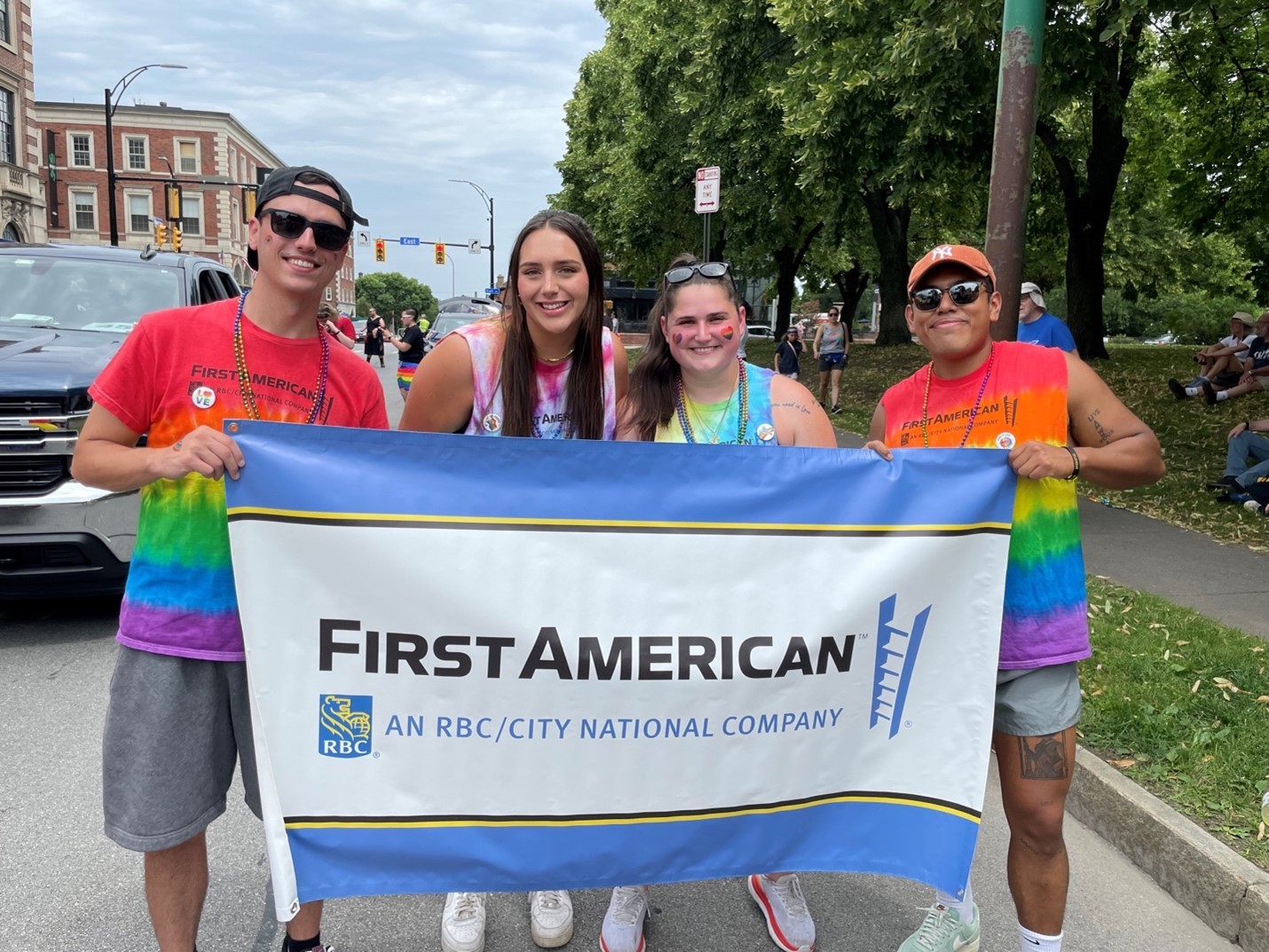 First American colleagues and friends at the 2023 ROC Pride Parade, celebrating the LGBTQ+ community in Rochester, NY.
