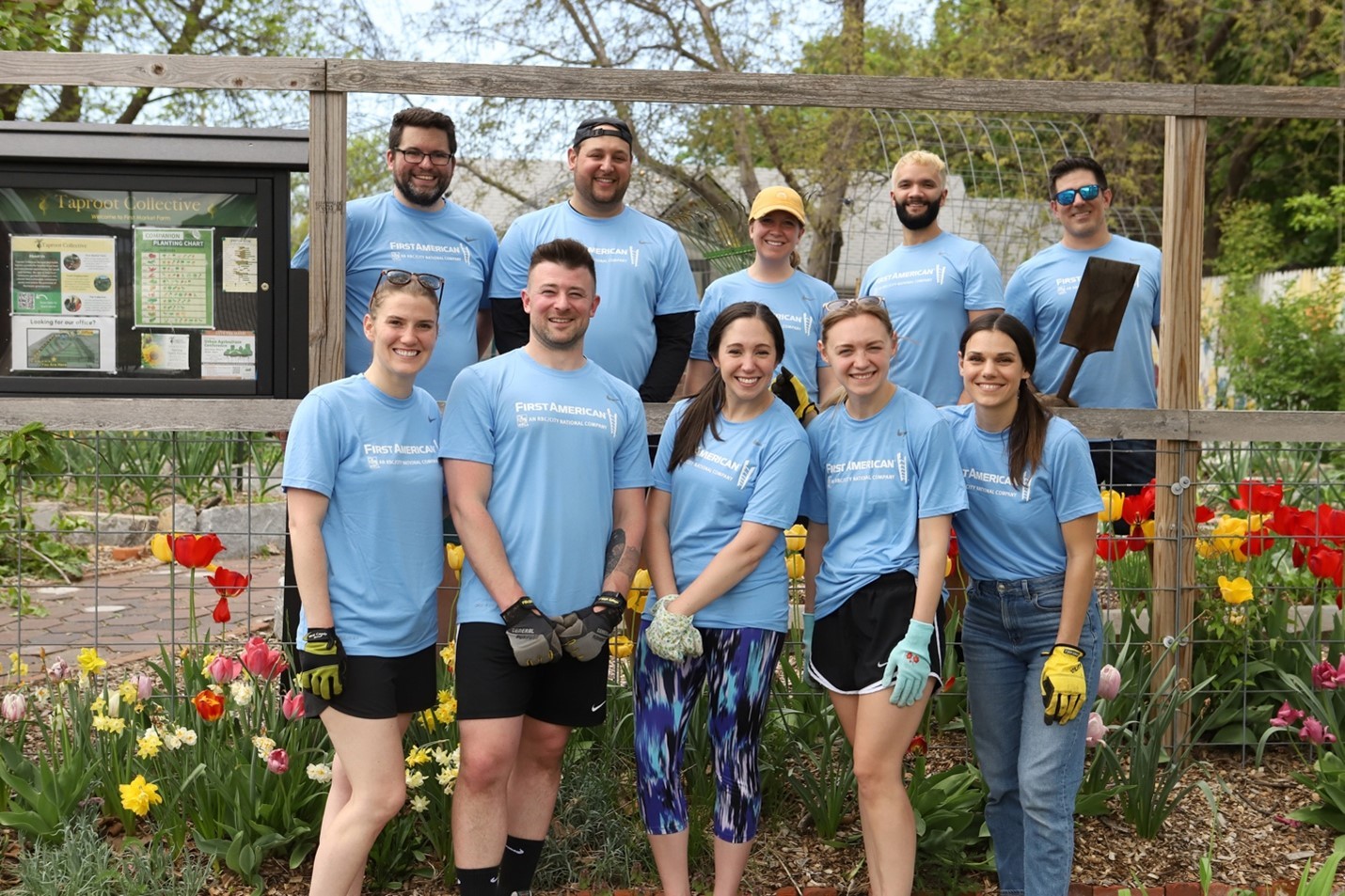First American colleagues volunteer at a community garden in Rochester, NY to prepare the grounds for the season.

