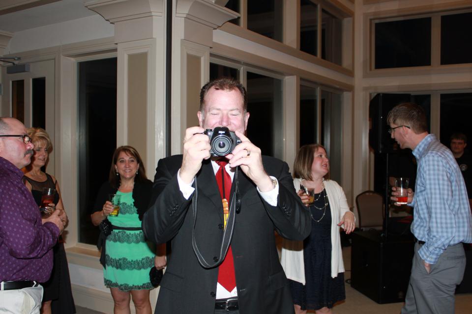 Tec Labs CEO, Steve Smith capturing photos at the end of year party
