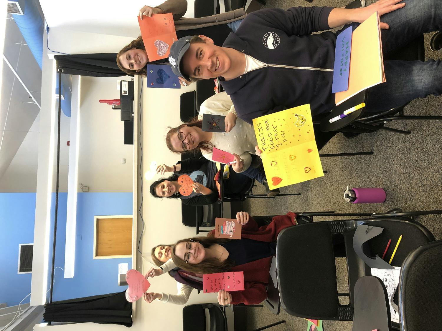 Each MLK Day, we participate in a half day of service. Volunteer activities take place in and outside of the office. The team pictured here created cards for residents at a local nursing home.