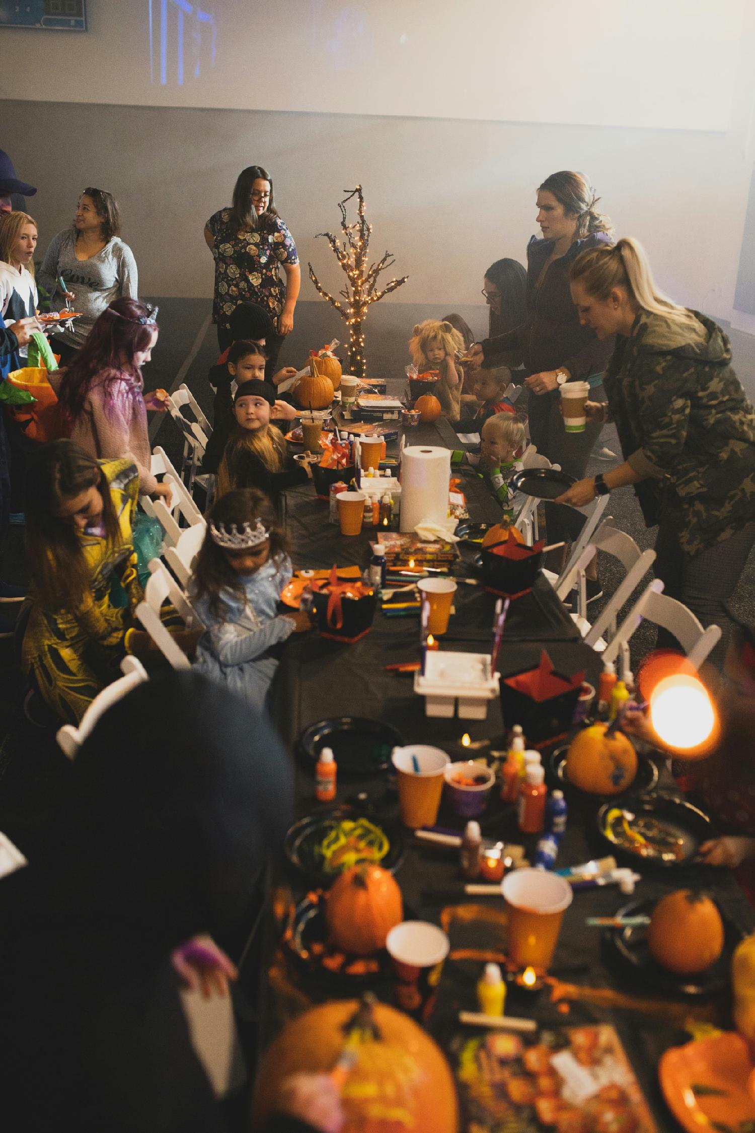 Scorpion loves to involve our kids in holiday celebrations when we can. Halloween pumpkin painting for the kids at HQ! 