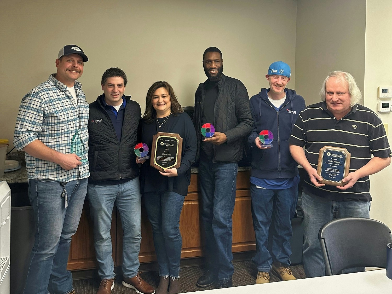 Fishkill team award winners showing off their awards after our Annual Meeting