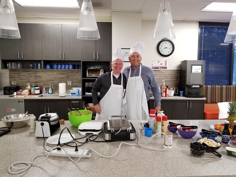 CEO & COO serving up waffles!