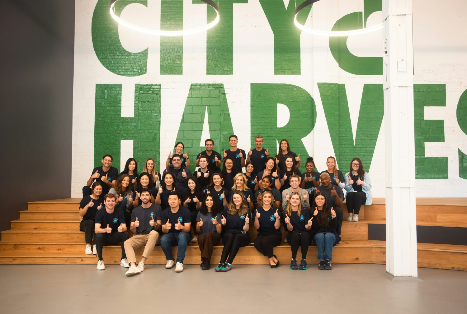 US employees repack food at City Harvest during annual Global Fight Hunger campaign 
