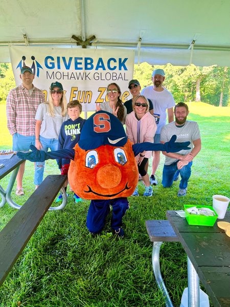 Members of our Syracuse team volunteering for the Arc of Onondaga annual race and sponsoring the Family Fun Zone