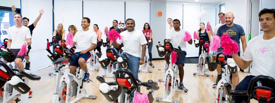 Workday employees Cycle for a Cause raising funds for the National Breast Cancer Foundation.