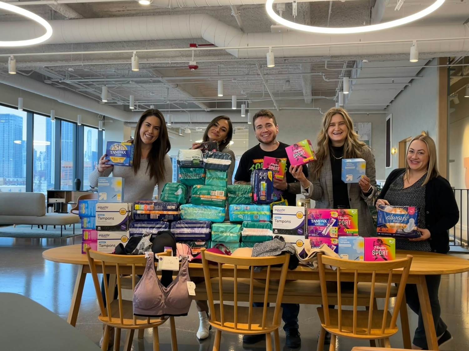 Convene's Chicago team getting together to donate products to Support the Girls