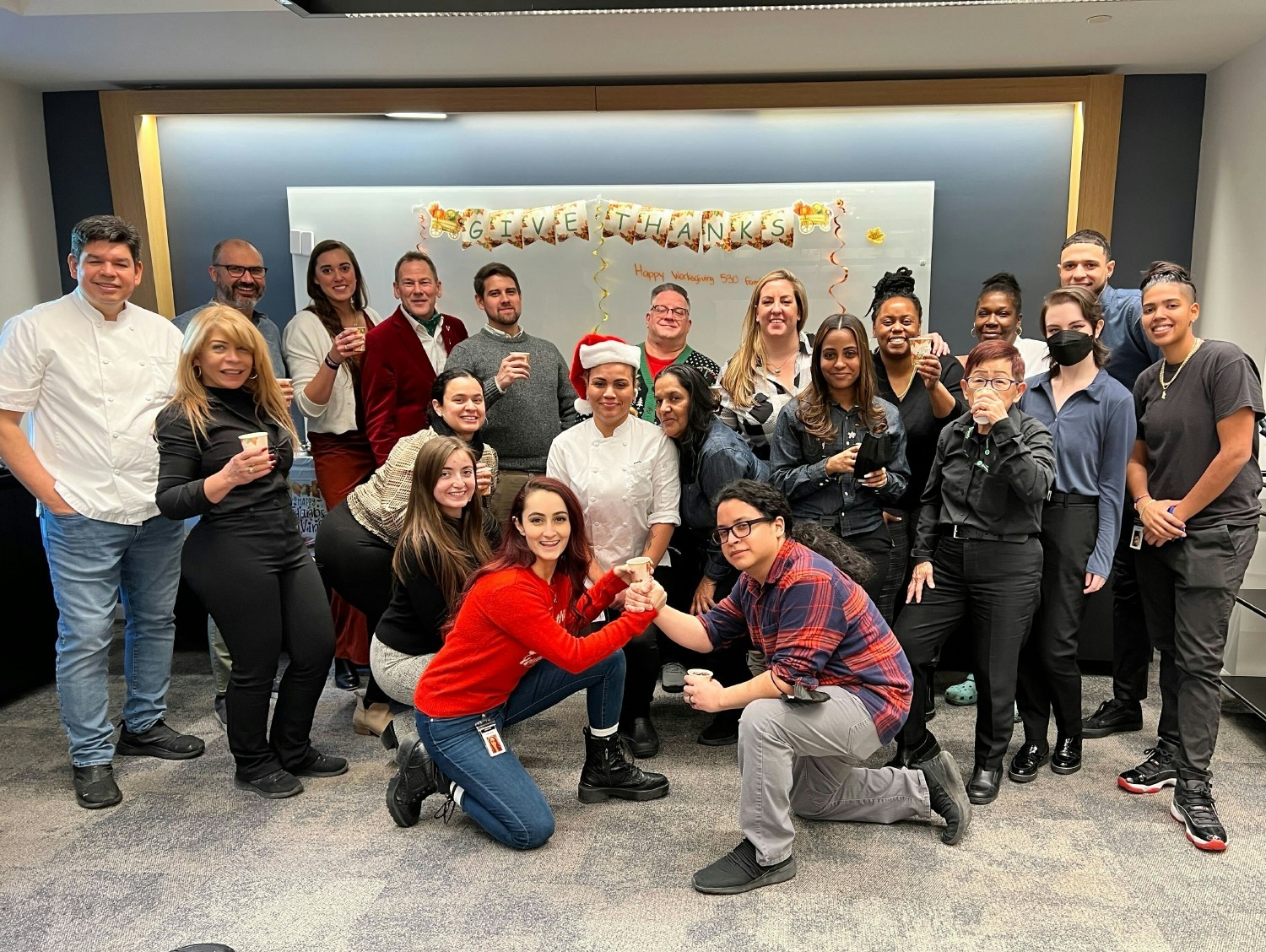 Convene's NYC team giving thanks with a holiday potluck meal together