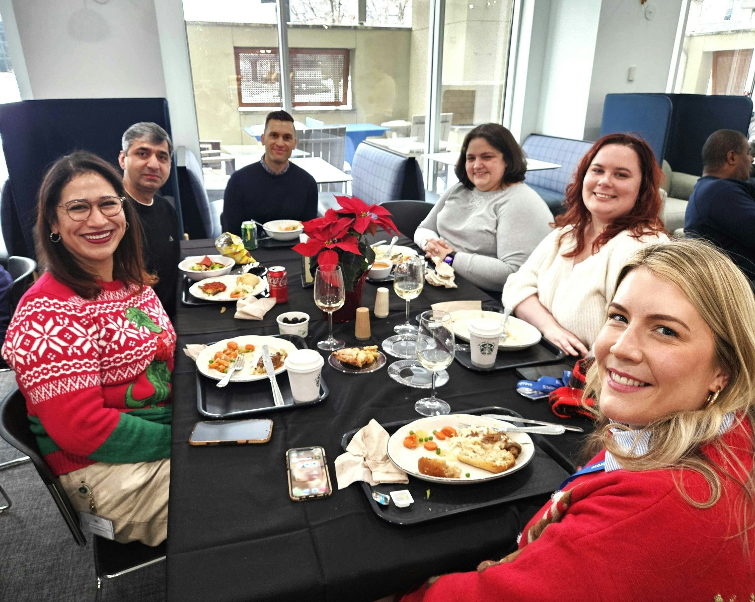 Siteimprovers enjoying a holiday lunch and festivities in the Bloomington, MN office.