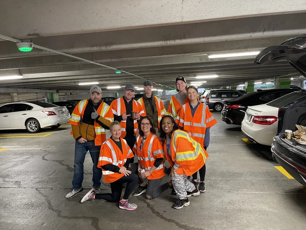 TIAG employees join forces in cleaning up our environment for Adopt-a-Highway cleanup in Reston, VA
