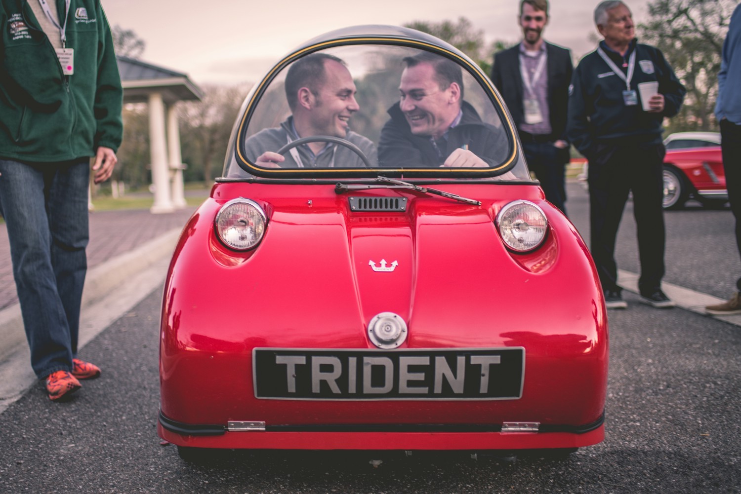 Team members squeezing in for a ride in a 1965 Peel Trident. Fun fact: you can fit 31 Trident’s in a two-car garage