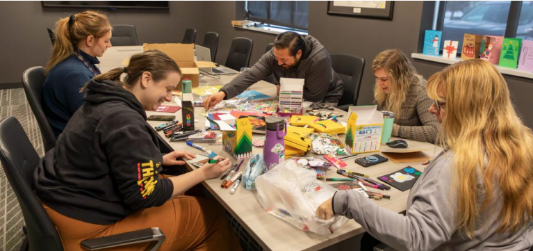 Employees came together to create holiday cards and share messages of hope with hospitalized children.