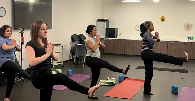 Yoga in our onsite Wellness Room.
