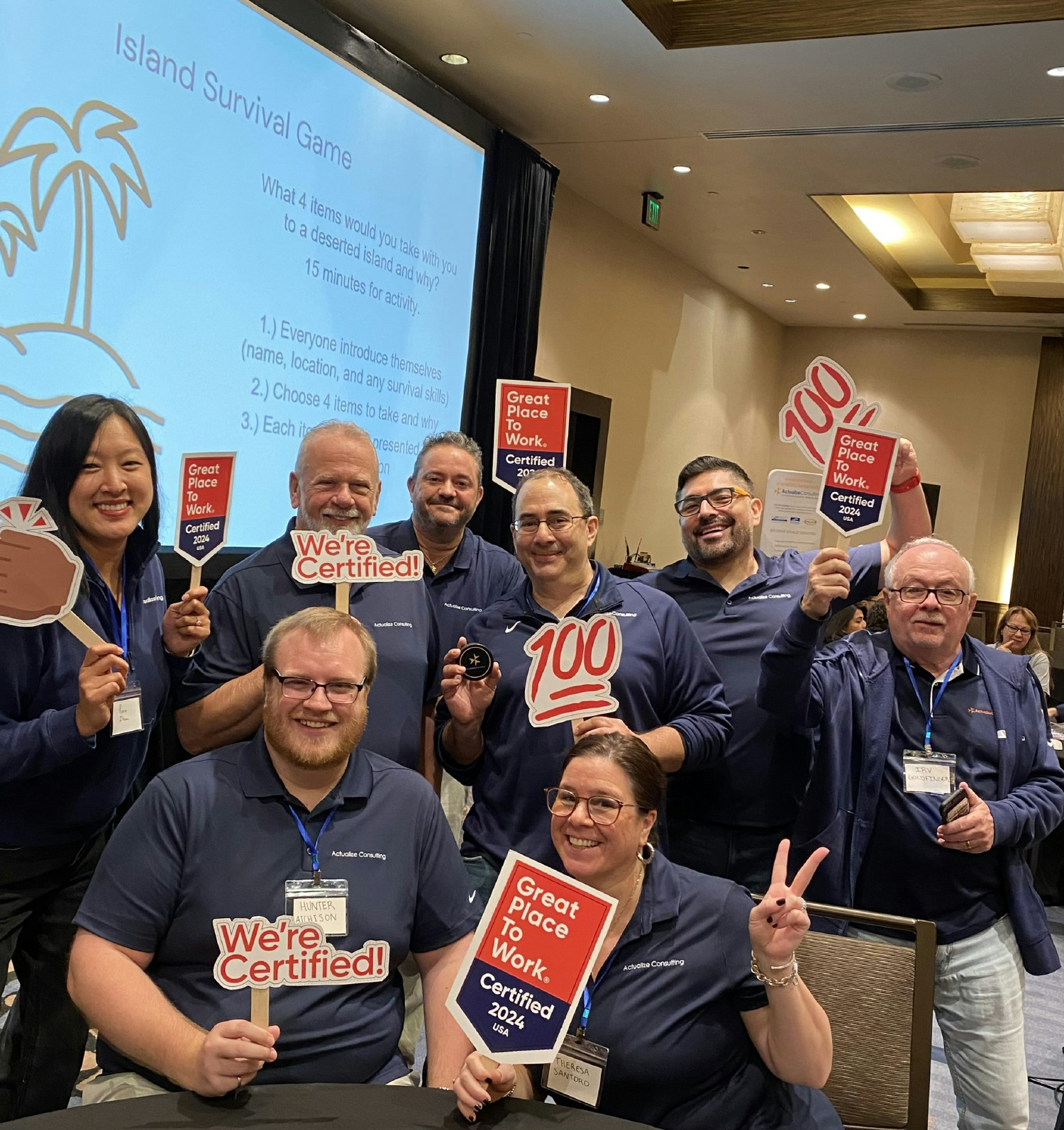 Actualize Consulting pausing from Island Survival team- building activity to celebrate another year GPTW certification. 