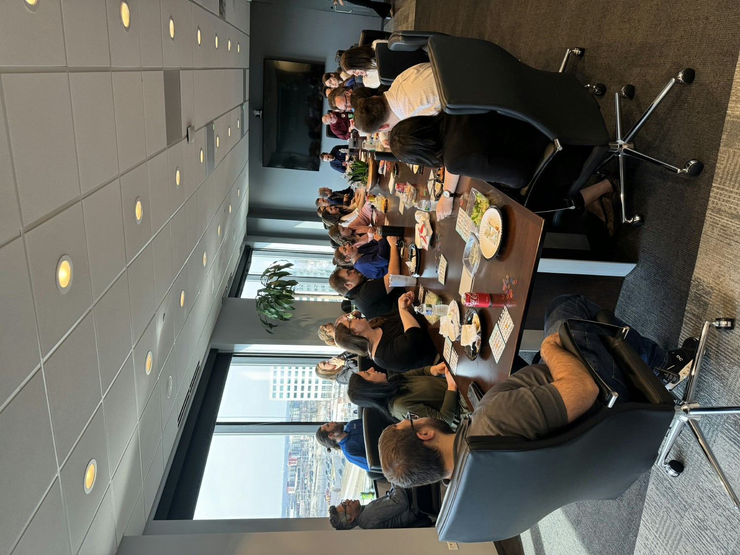Team gathering in the Downers Grove office for lunch and a game of bingo!