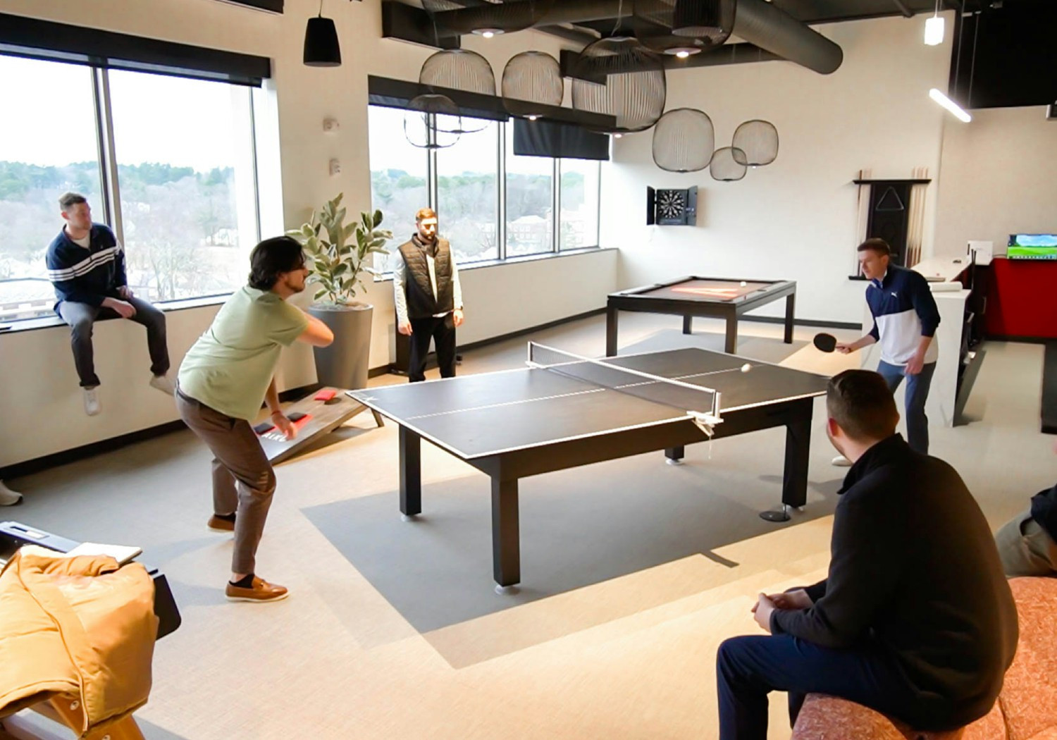 ALKU's Andover Headquarters includes a game area where employees can take a break and relax with their coworkers.