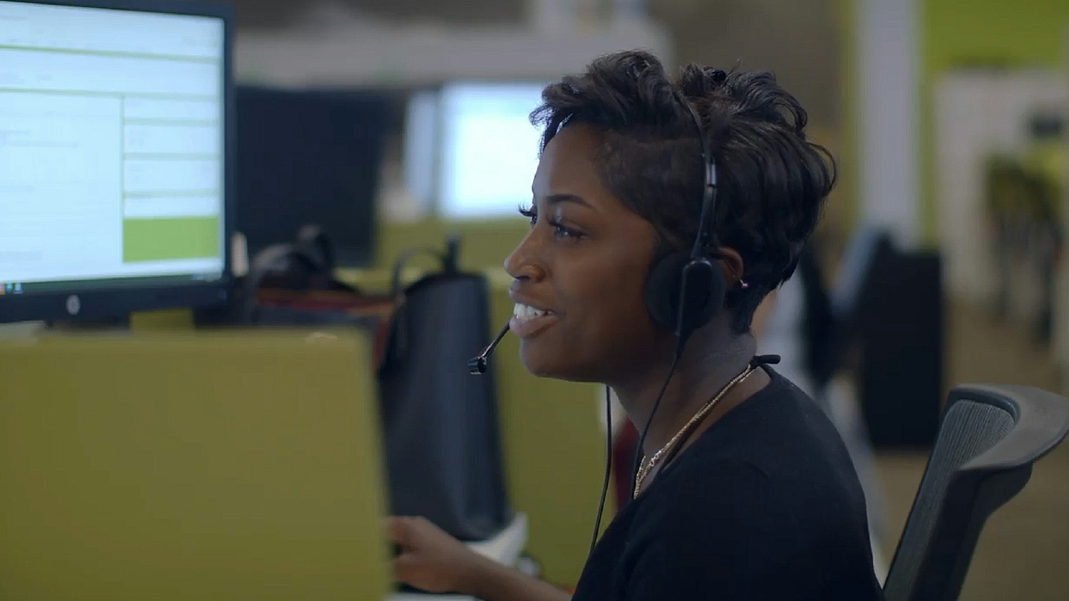 Colleague from Consumer and Regional Banking demonstrating our Service Heart value with each customer interaction.