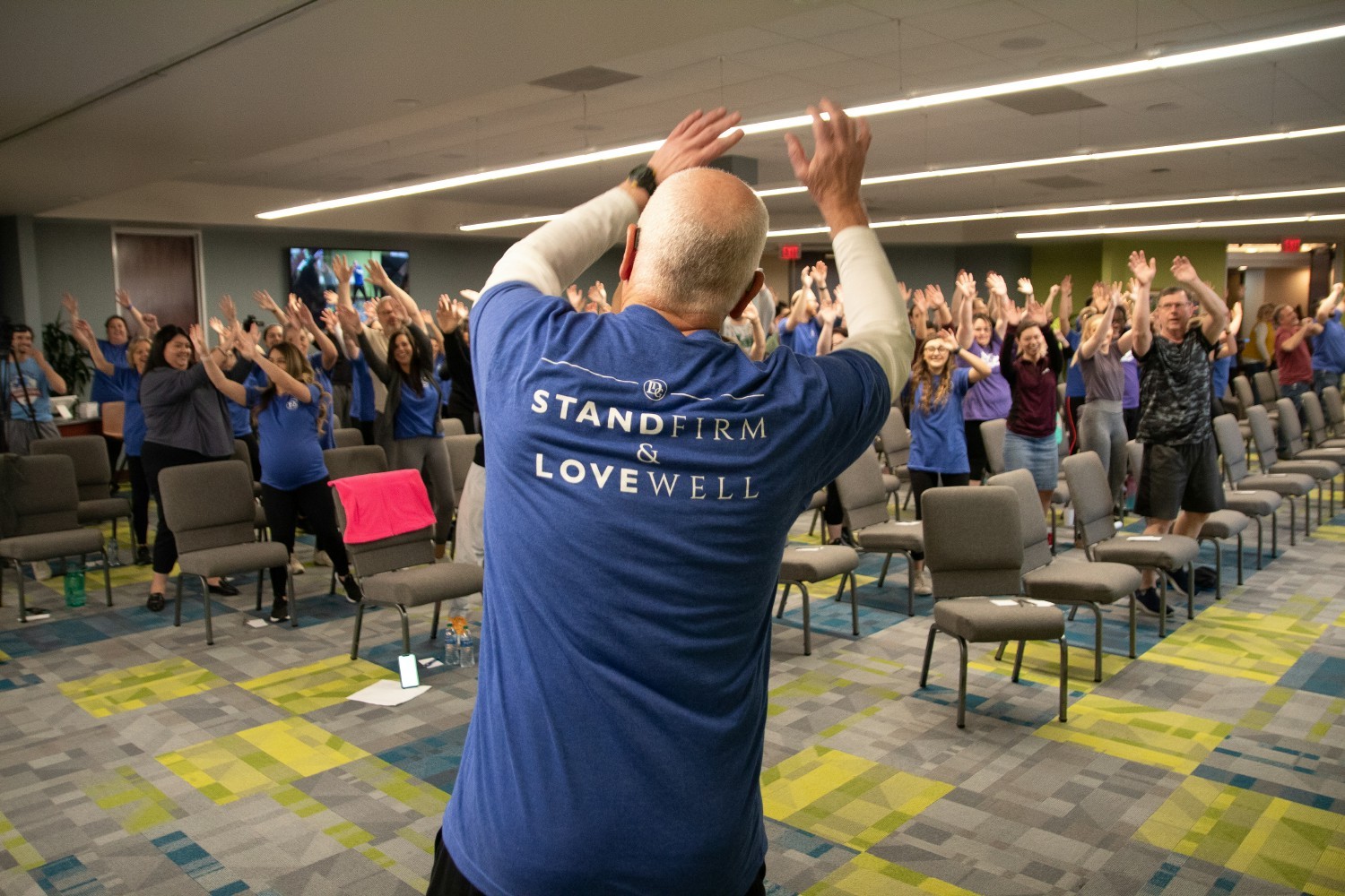 CEO Kris Seale leads a company workout while propelling DIG towards its theme of the year!