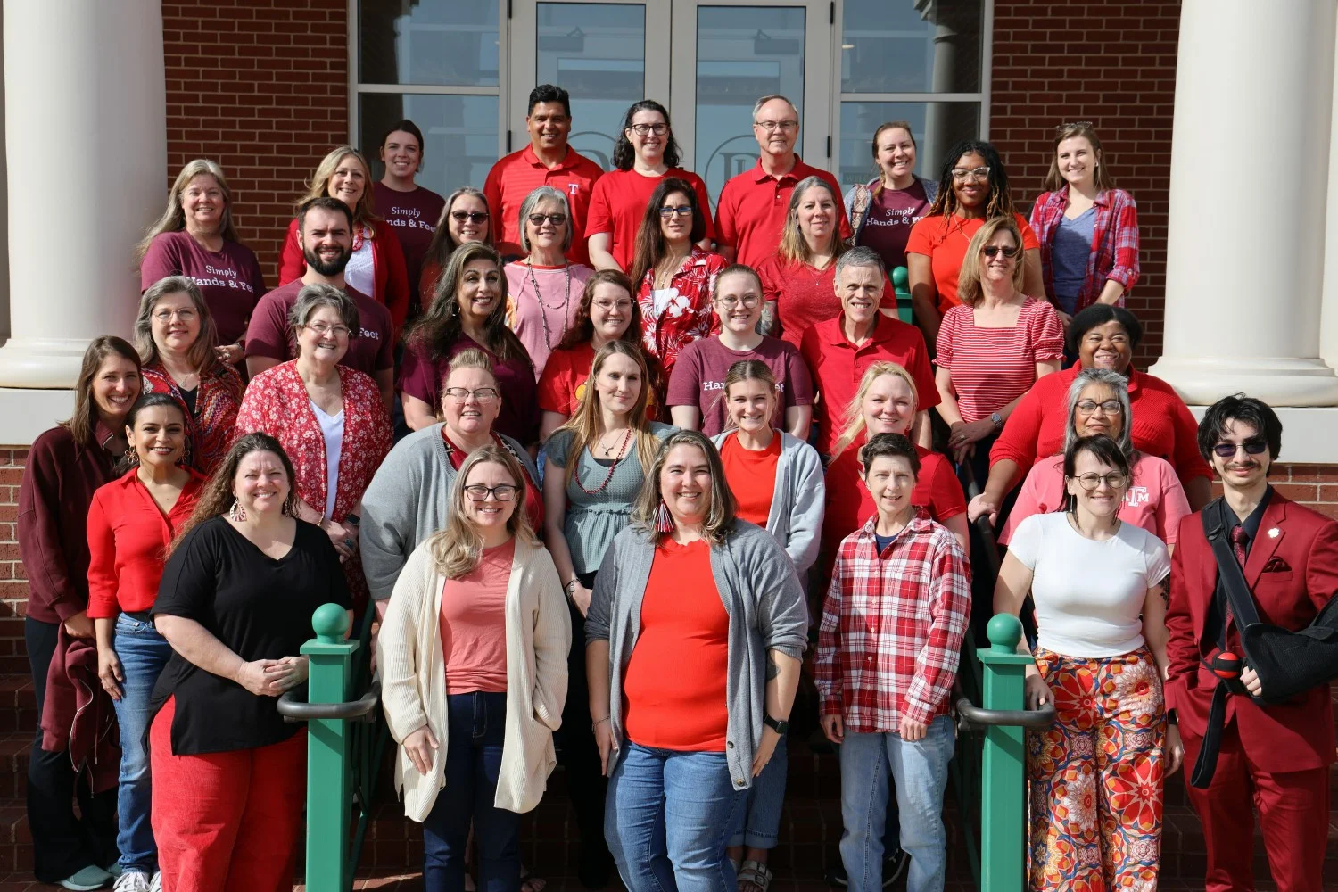 Employees wear red in recognition of Autism Acceptance Day.