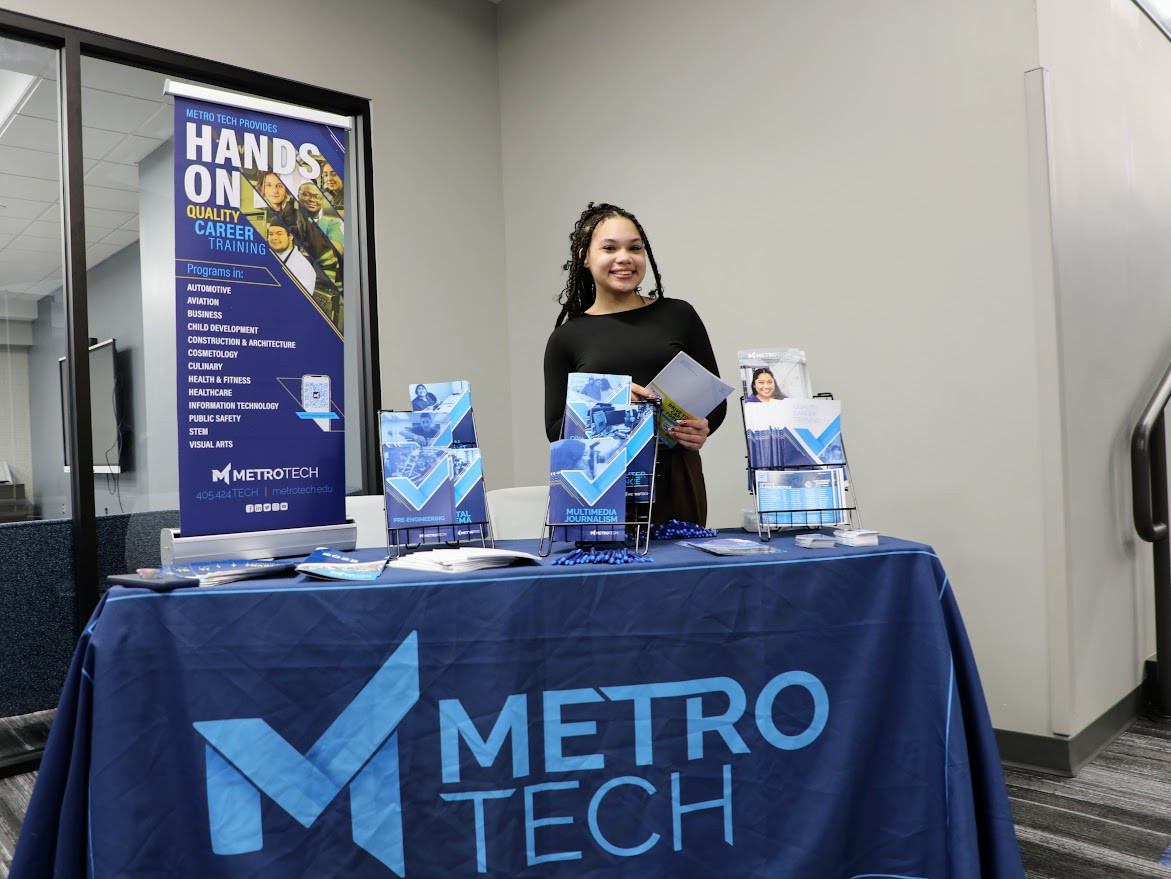 One of our part-time wellness receptionist manning the Metro Tech booth during an event.
