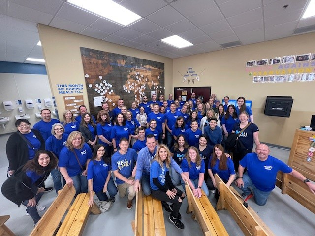 Arizona team members pack meals for Feed My Starving Children. 