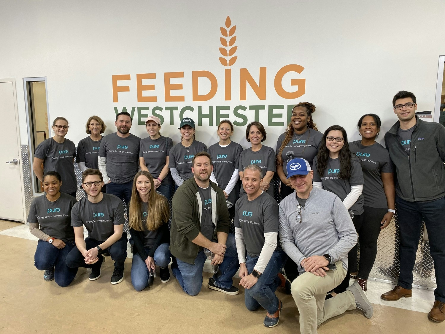 White Plains team volunteering at Feeding Westchester.