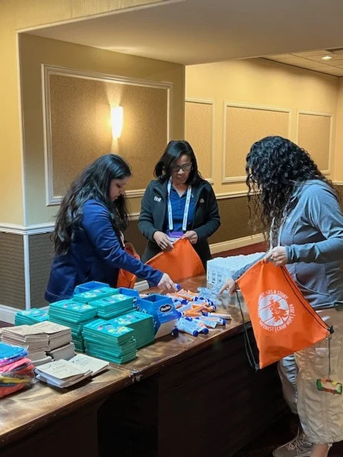 Finitians organize camp supplies for underprivileged children.