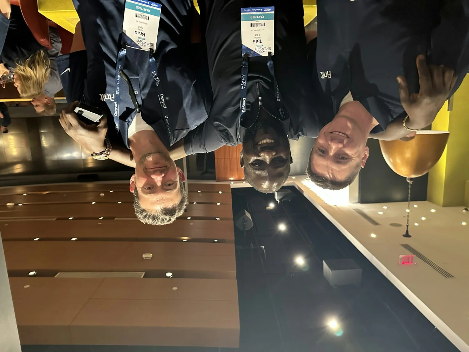 Three Finitians enjoy spending time together at an industry conference.