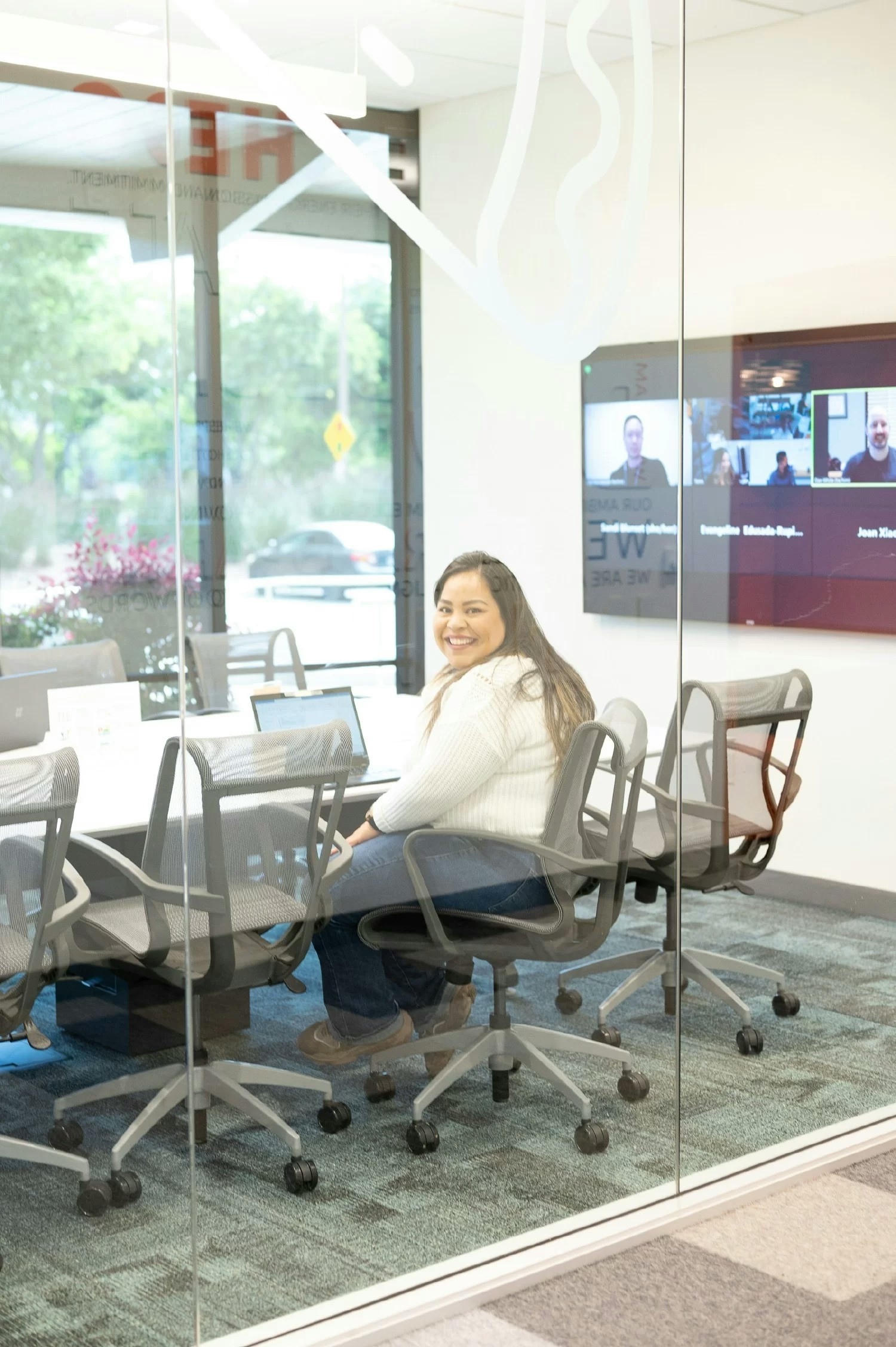 An employee using one of our conference rooms.