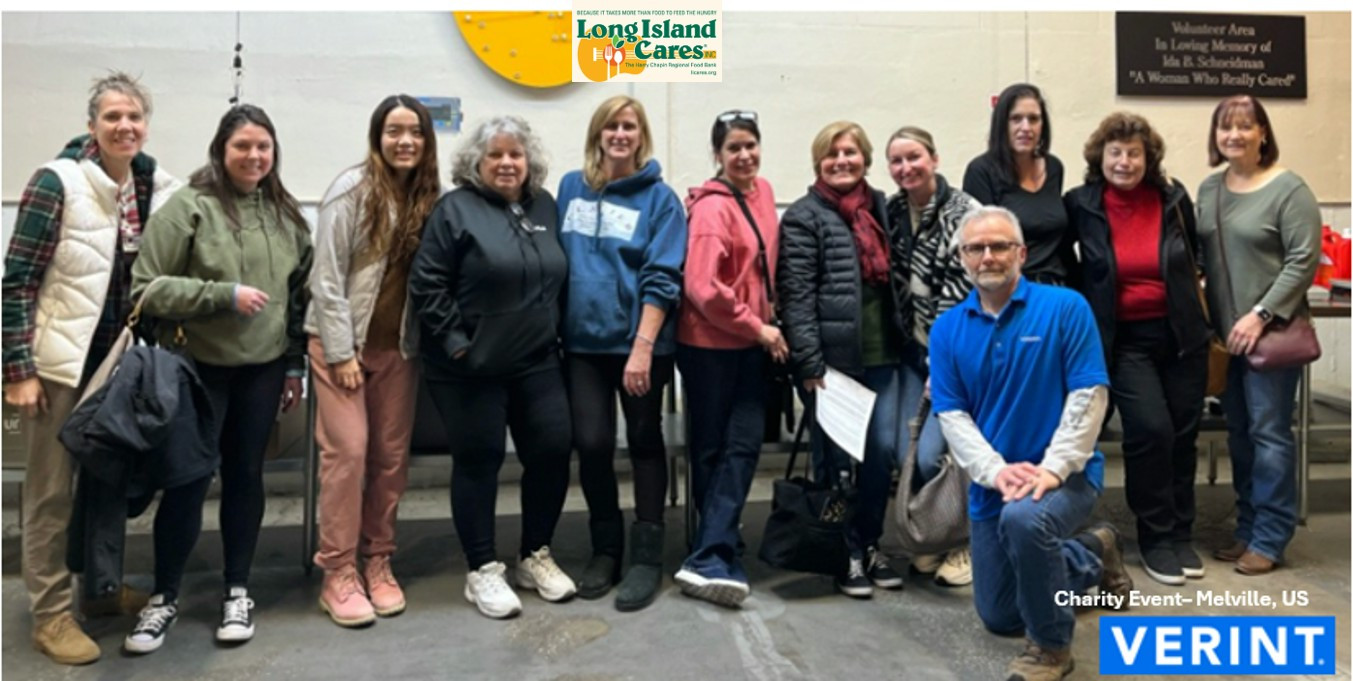 Verinteers volunteer at LI Cares packing food donations