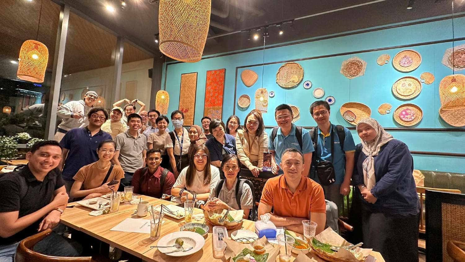 Employees enjoying a dinner together out of the office.