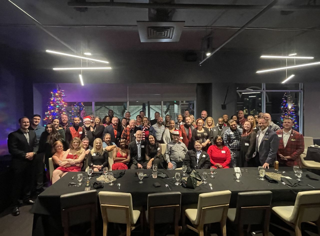 Team Members at the MartinFed Christmas dinner party. 