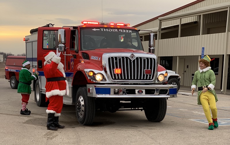 Employees participate in our annual Cookies with Santa celebration at the Artesia office