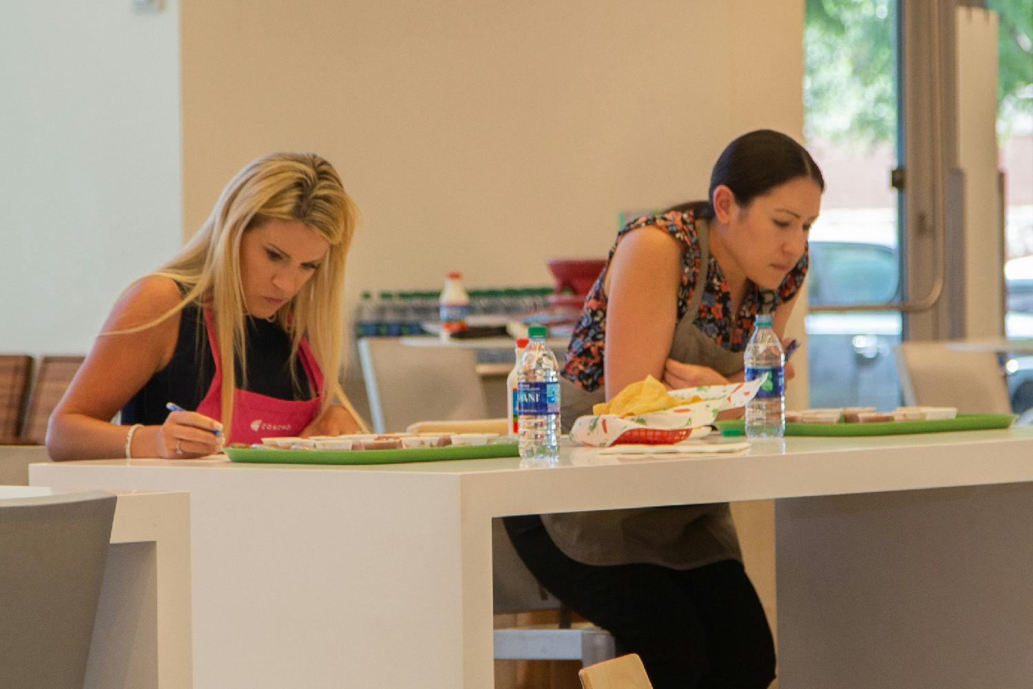 Employees judging salsa entries for annual salsa contest in our Midland office