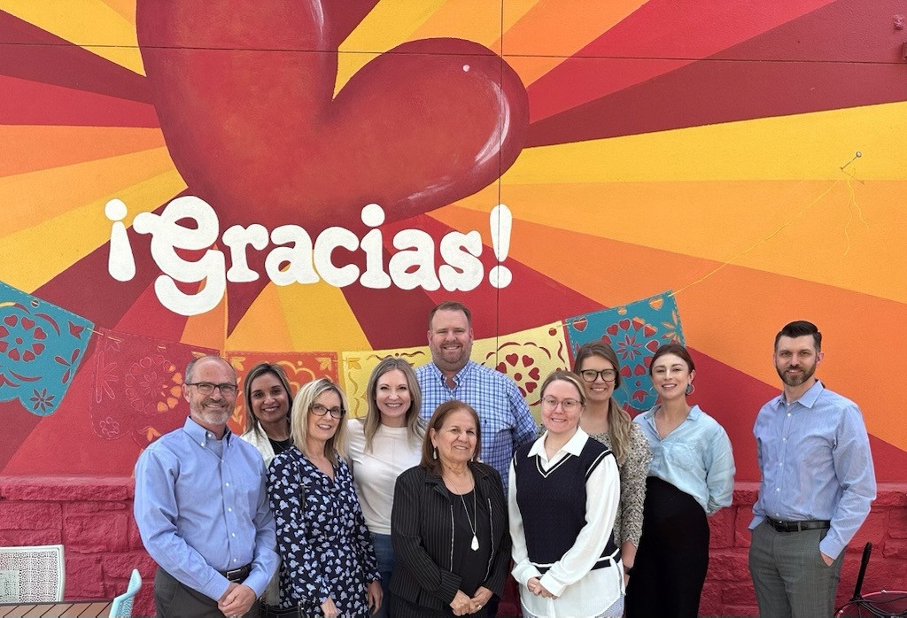 Austin Division Employee Owners visit a Heart of Highland recipient, supporting local charities statewide each quarter.