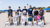 Miami team members and their families volunteered to preserve and beautify a local beach