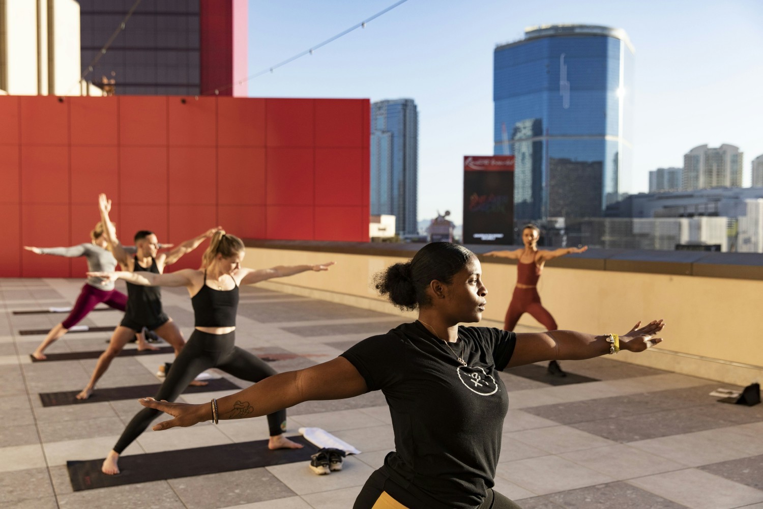 Here are some Yexters enjoying a sunrise rooftop Yoga session. Investing in our employees’ well-being is a top priority.