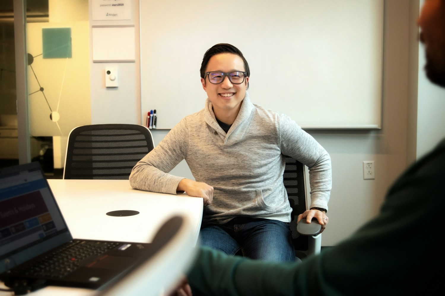 Alnylam employees collaborating in a meeting