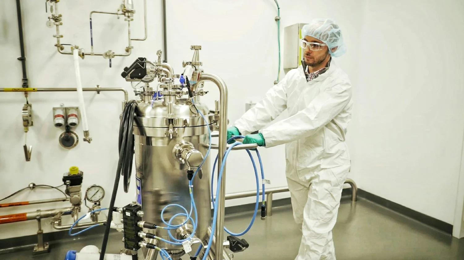 Alnylam employee working in the manufacturing facility