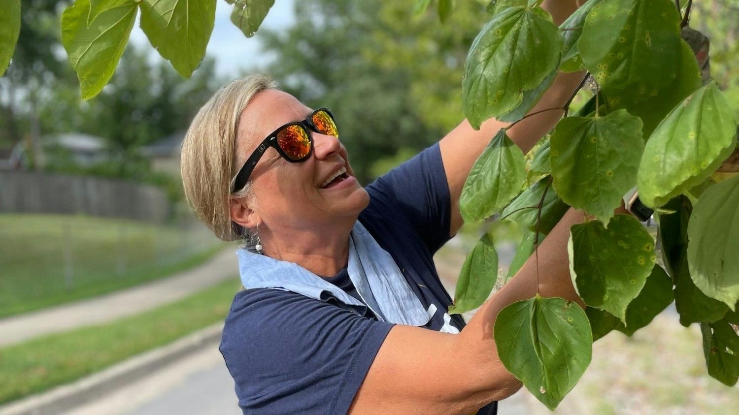 An MEM employee volunteers her time to care for our Adopt a Spot location in Columbia, MO.