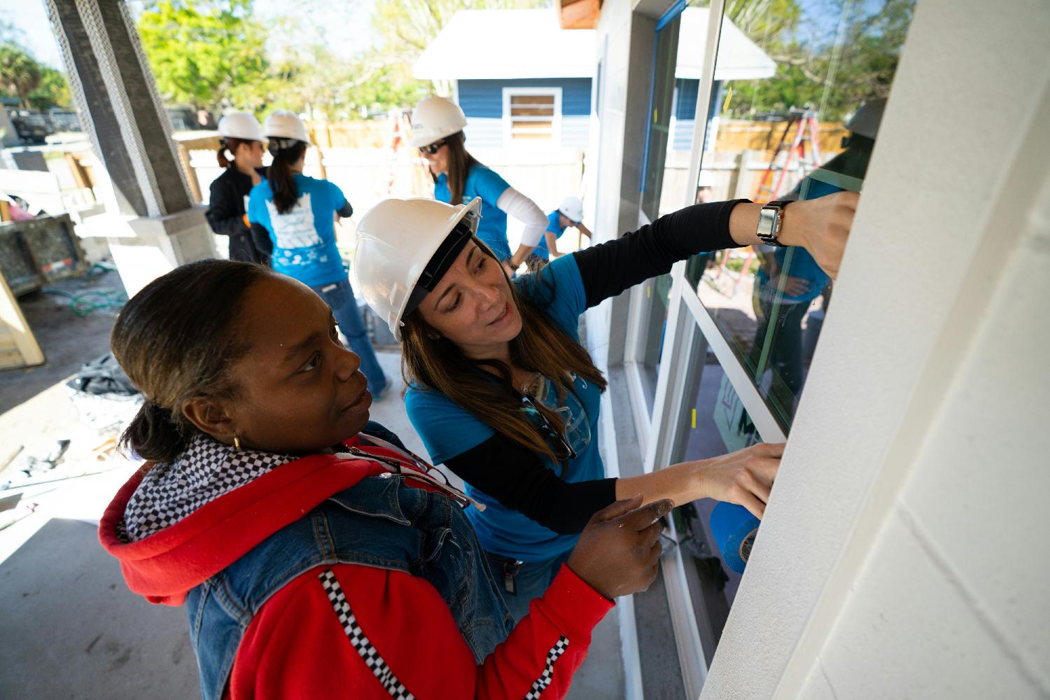 In early 2020, a cross-departmental group of strong PDI women participated in a local Habitat for Humanity build.